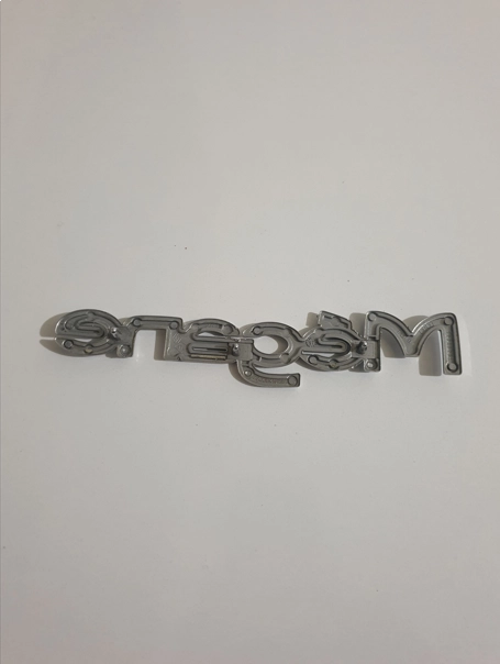 resimler/genel/Megane 1-I Arka Yazı Monogram (1995-2002) 7700845989  ORJİNAL ÇIKMA